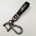 Sleek Black Leather Keychain – Red-Accented Emblem with Secure Metal Carabiner